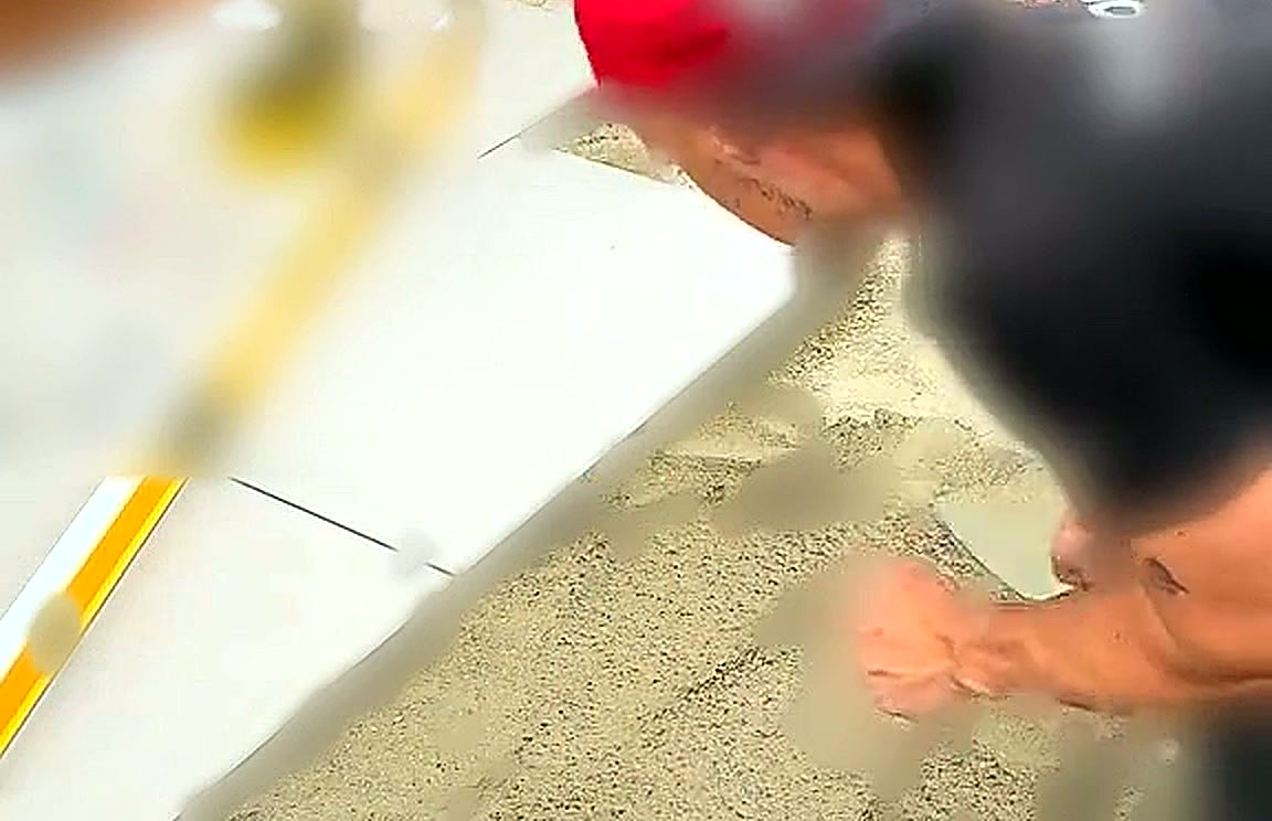 Mortar bed being screeded to an even depth across the terrace