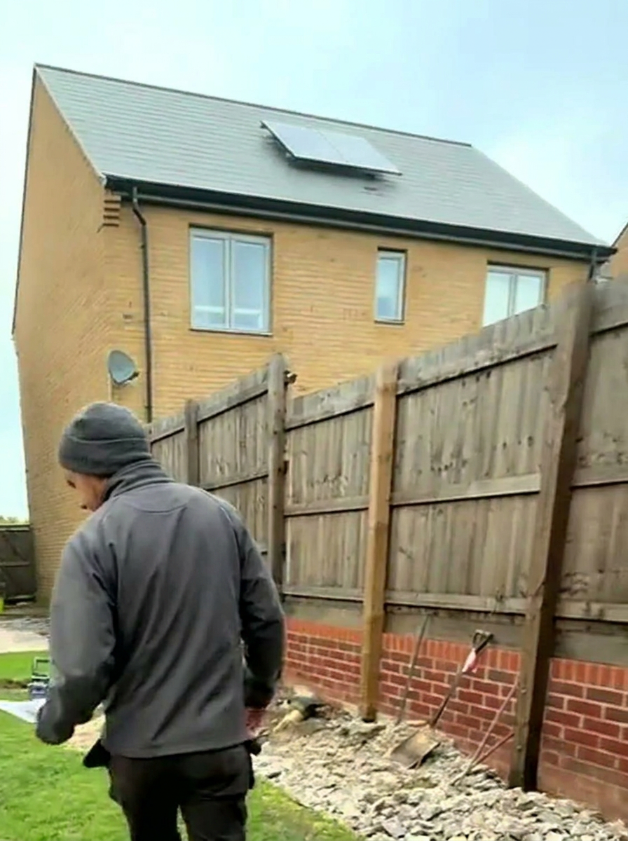 Bare, rutted new-build rear garden before landscaping work begins