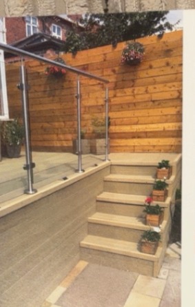 Savanna composite decking design inspiration — Raised Deck & Glass Balustrade